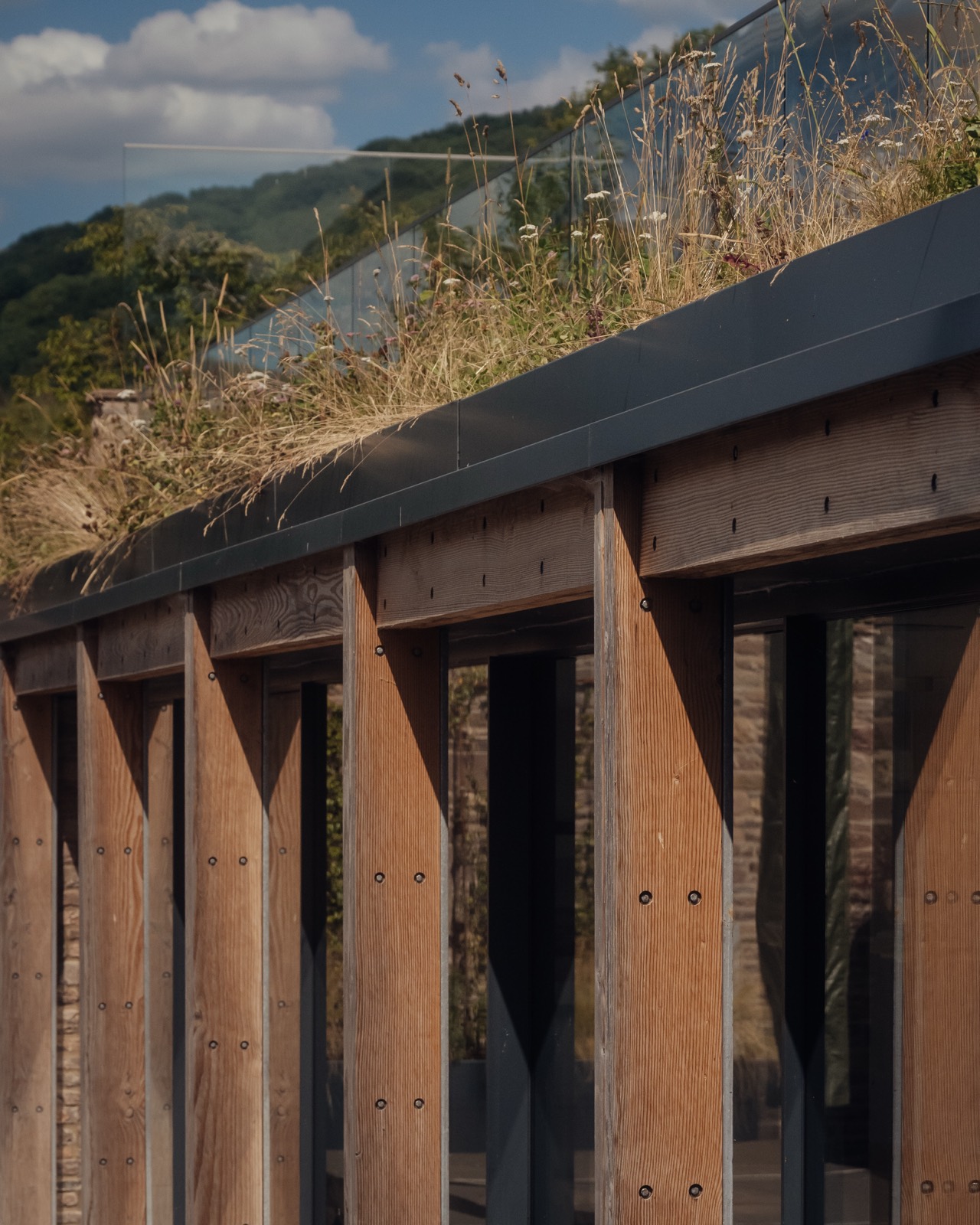 The timber colonnade along the extension