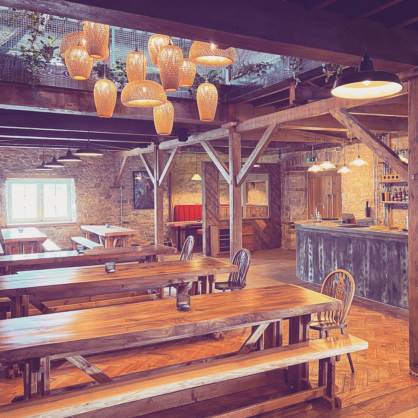 Trestle tables and the bar in the taproom